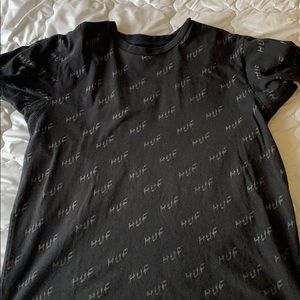 Black Huf shirt with light in the dark huf logo